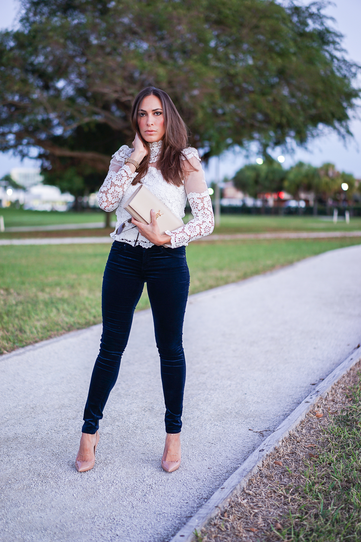 A Glam Lifestyle South Florida blogger wearing whic Chicwish lace top with AG Jeans velvet legging