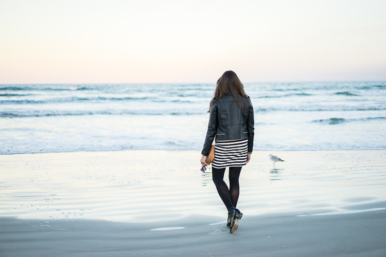 Maje black leather moto jacket and Topshop striped dress