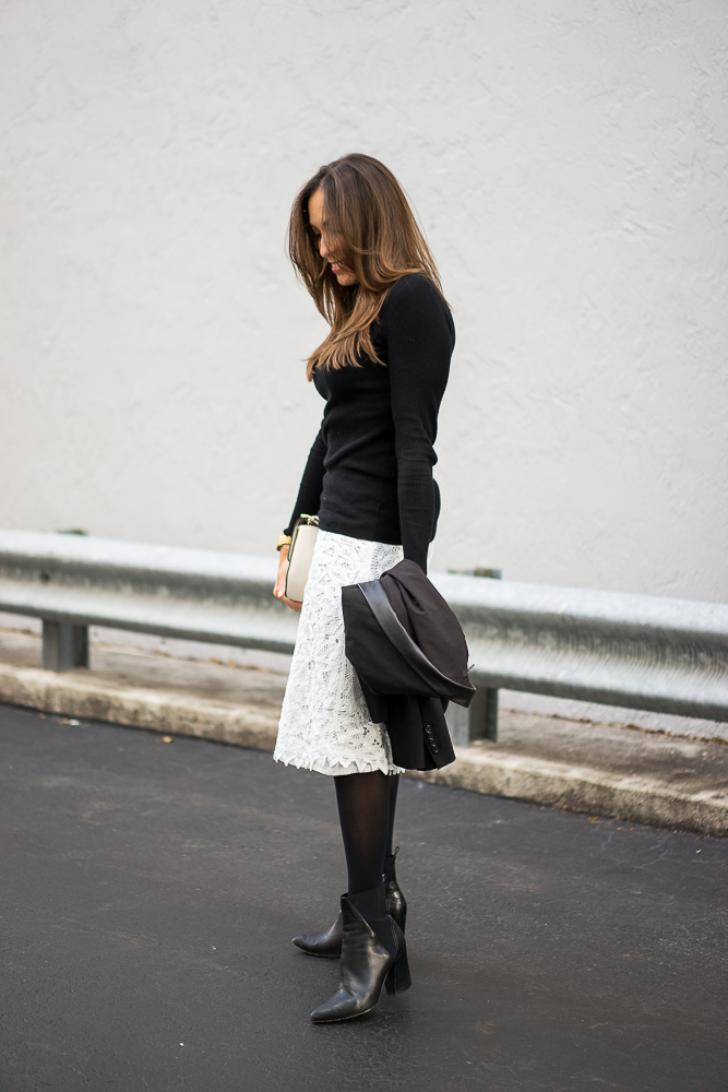 Express black ribbed turtleneck sweater and ASKA Collection Troy booties