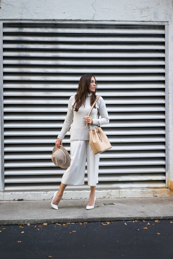 White culottes-grey tunic sweater-Club Monaco fedora-nude bucket bag