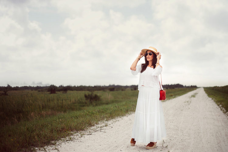 White maxi skirt, white off the shoulder top, straw boater hat