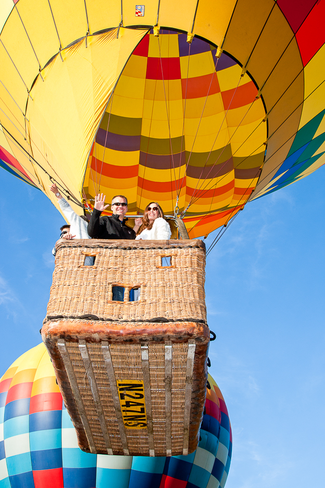 A Glam Lifestyle Blogger Amanda Champion shares Napa Hot Air Balloon Tour - in photo: a couple on a hot air balloon