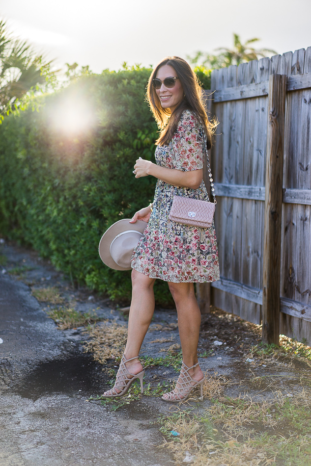 A Glam Lifestyle Blogger Amanda Champion wearing Zara floral dress with Miu Miu bag.