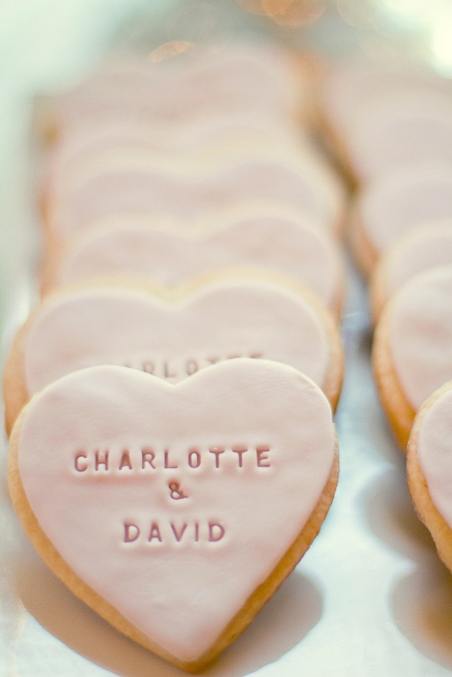 wedding favors including wedding cookies with wedding paper divas