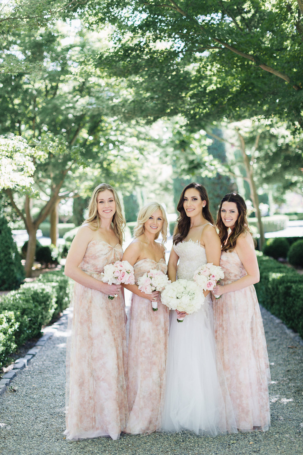 A Glam Lifestyle Blogger Amanda Champion shares a photo of with her bridesmaids