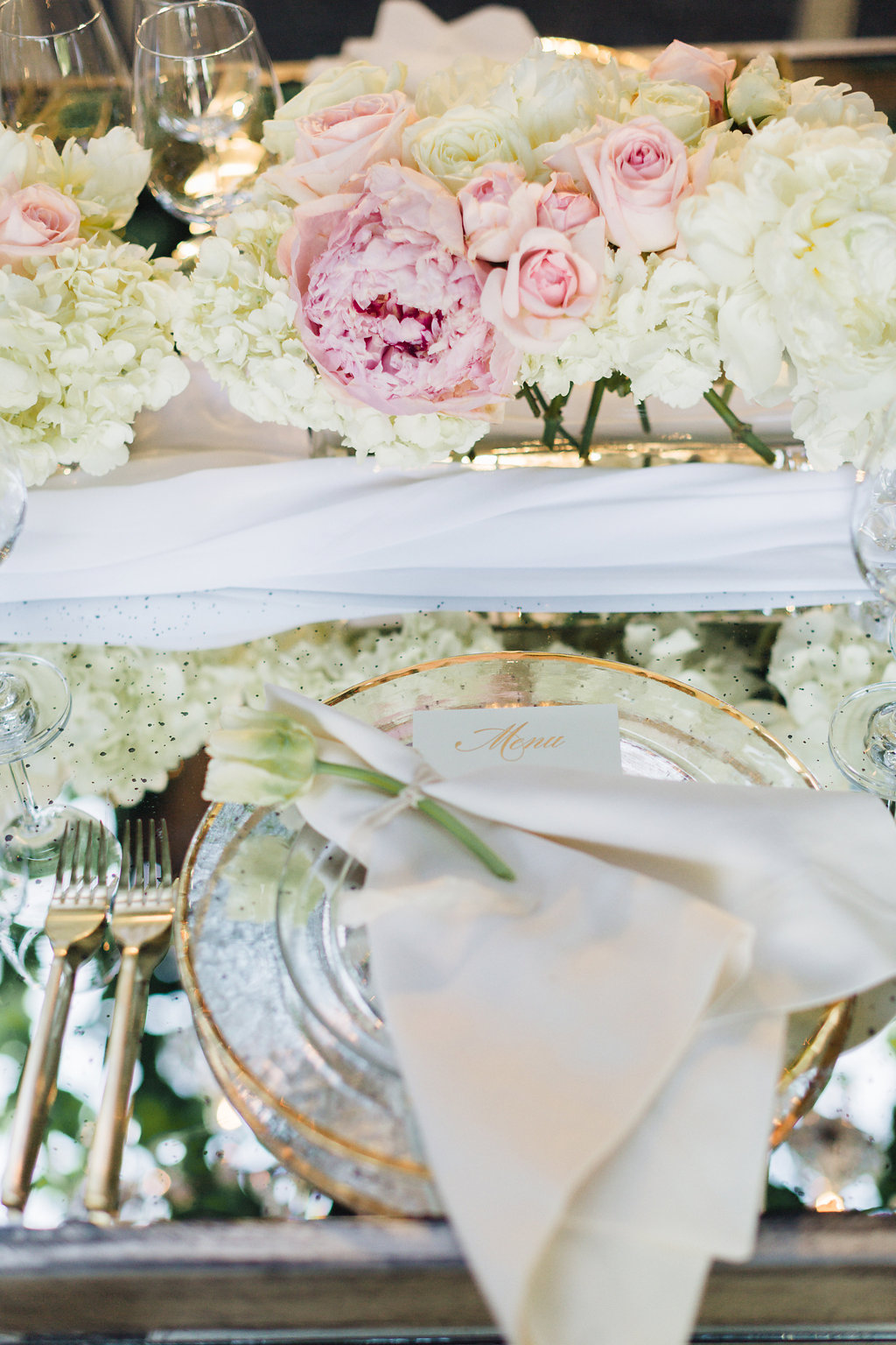 A Glam Lifestyle Blogger Amanda Champion shares a photo of ttheir table setting at the reception