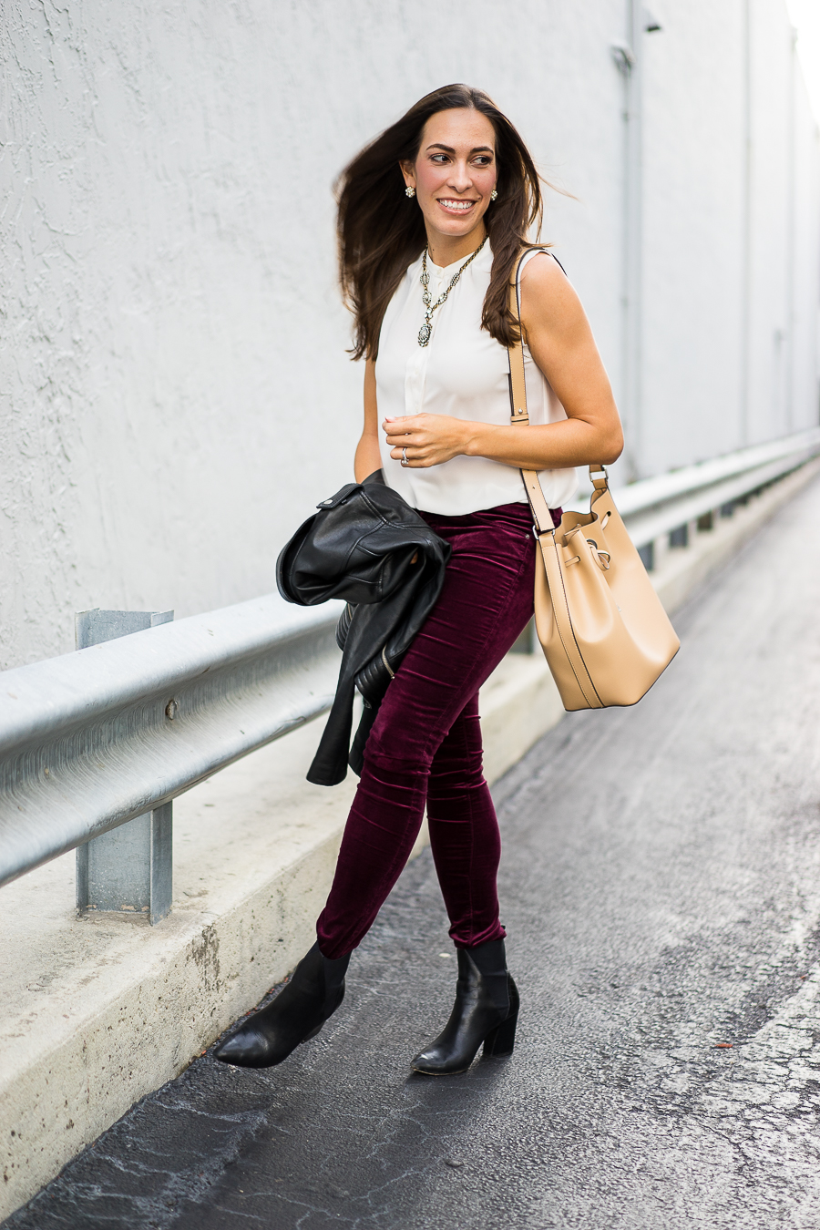 AG Velvet legging featured by top FL fashion blogger, a Glam Lifestyle: image of a woman wearing AG super skinny velvet legging