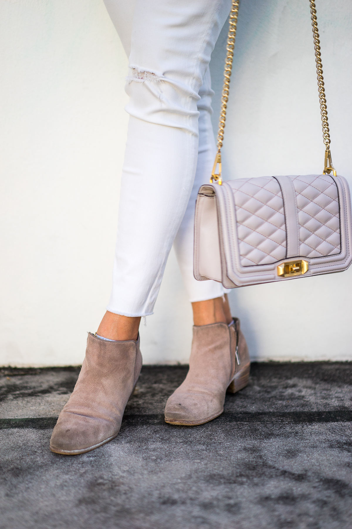 A Glam Lifestyle blogger wears Sam Edelman petty boots with Rebecca Minkoff love crossbody bag