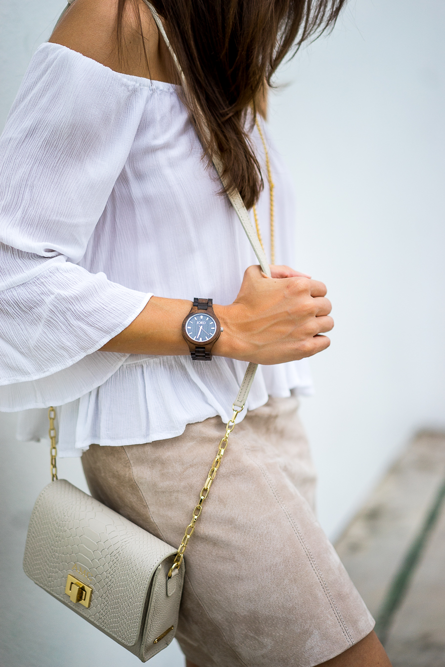 A Glam Lifestyle Blogger Amanda Champion shares JORD Wood Watch + Giveaway - in photo: Amanda wearing a white offshoulder top, brown skirt, and a watch