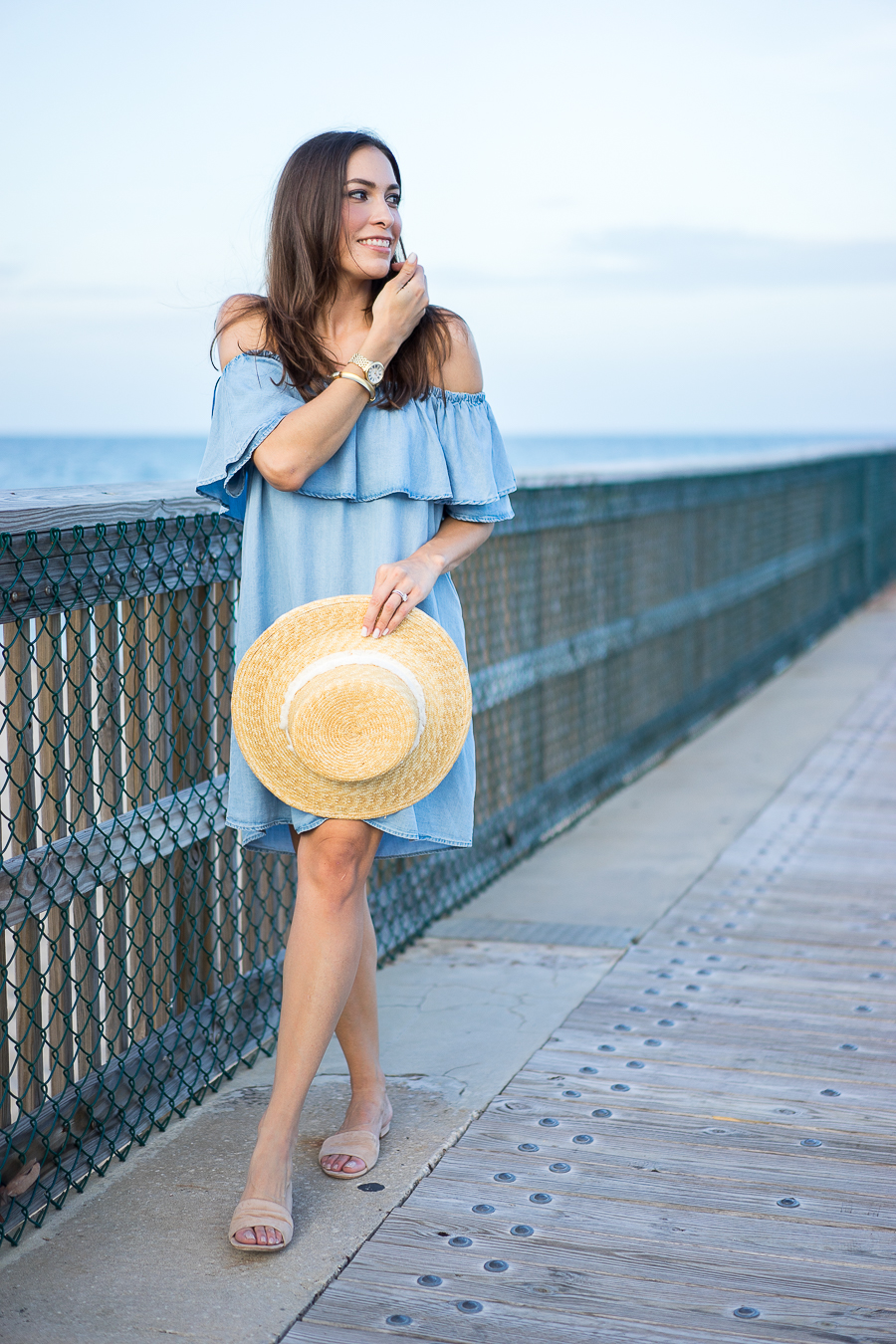 A Glam Lifestyle Blogger Amanda Champion wearing Soft Chambray Denim Dress and holding her Rag and Bone Laurie straw boater hat 