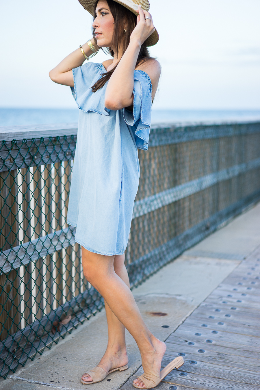 A Glam Lifestyle fashion blogger wearing Zara chambray denim dress with Rag and Bone Laurie straw boater hat and MGemi sandals