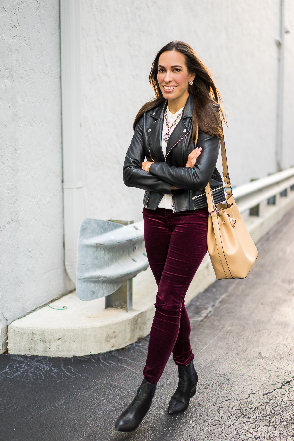 AG Velvet Leggings featured by top FL fashion blogger, A Glam Lifestyle: image of a woman wearing AG super skinny velvet leggings