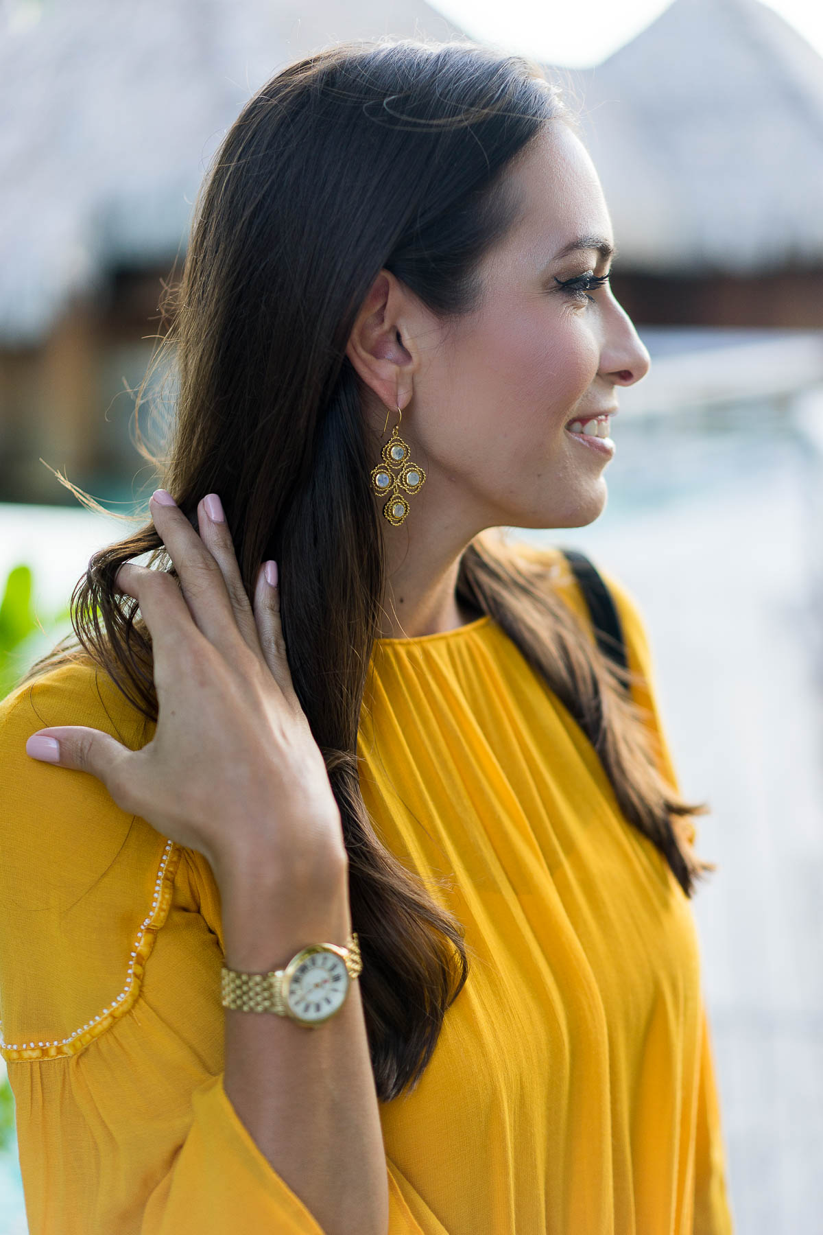 A Glam Lifestyle blogger wears Julie Vos earrings on honeymoon in Bora Bora