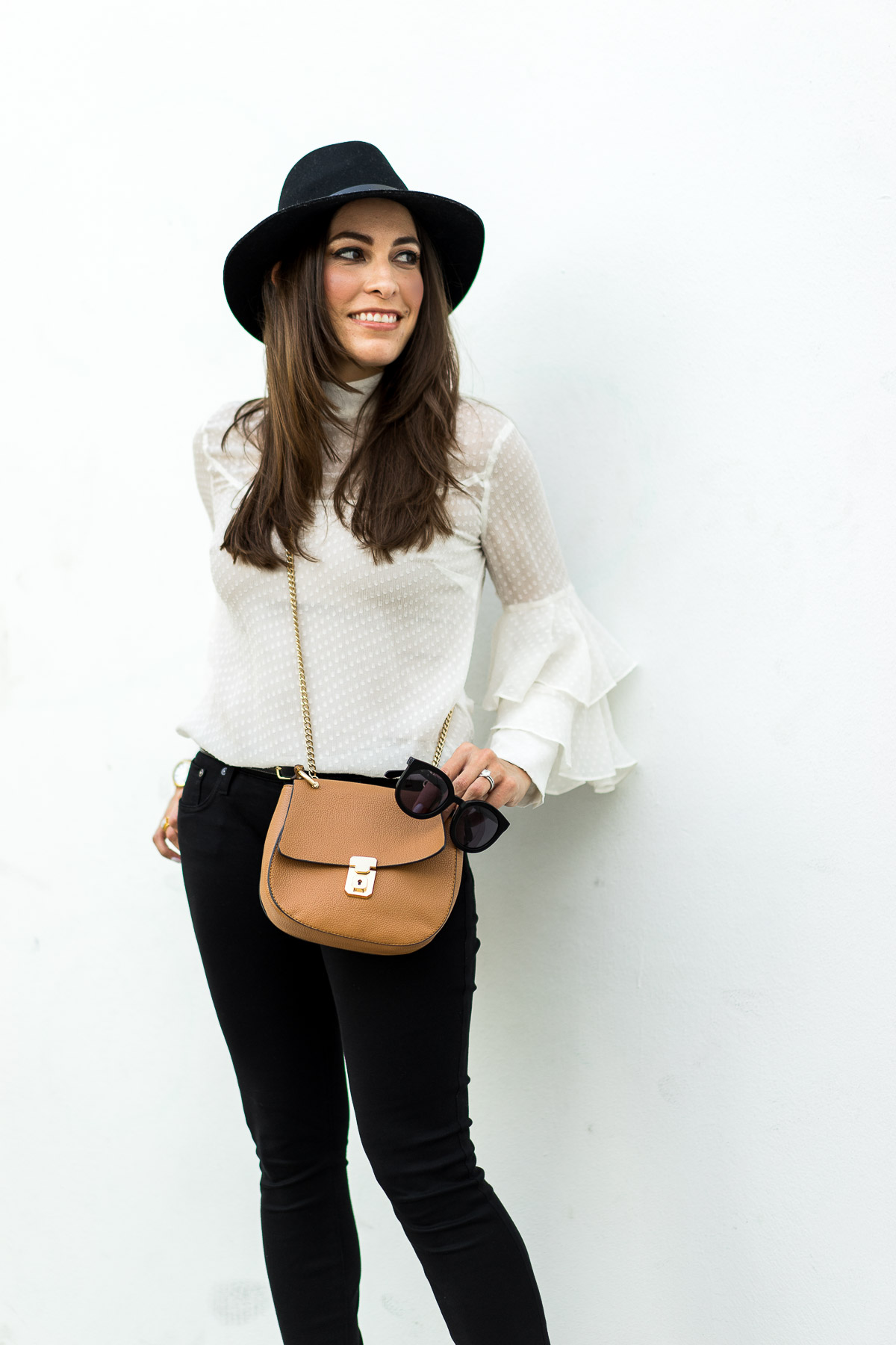 A clean sheer white blouse is easy fashion by Amanda of A Glam Lifestyle blog
