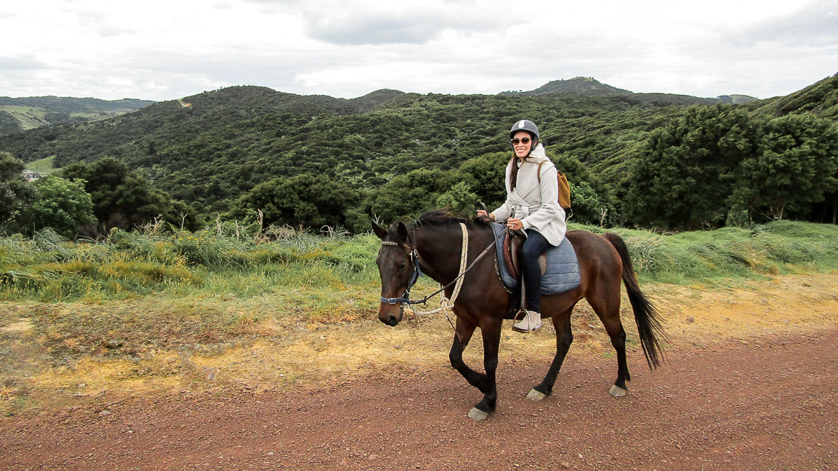 Fashion blogger from A Glam Lifestyle takes a Waiheke Island horseback riding tour in Te Matuku Bay and includes it in best things to do in Waiheke Island
