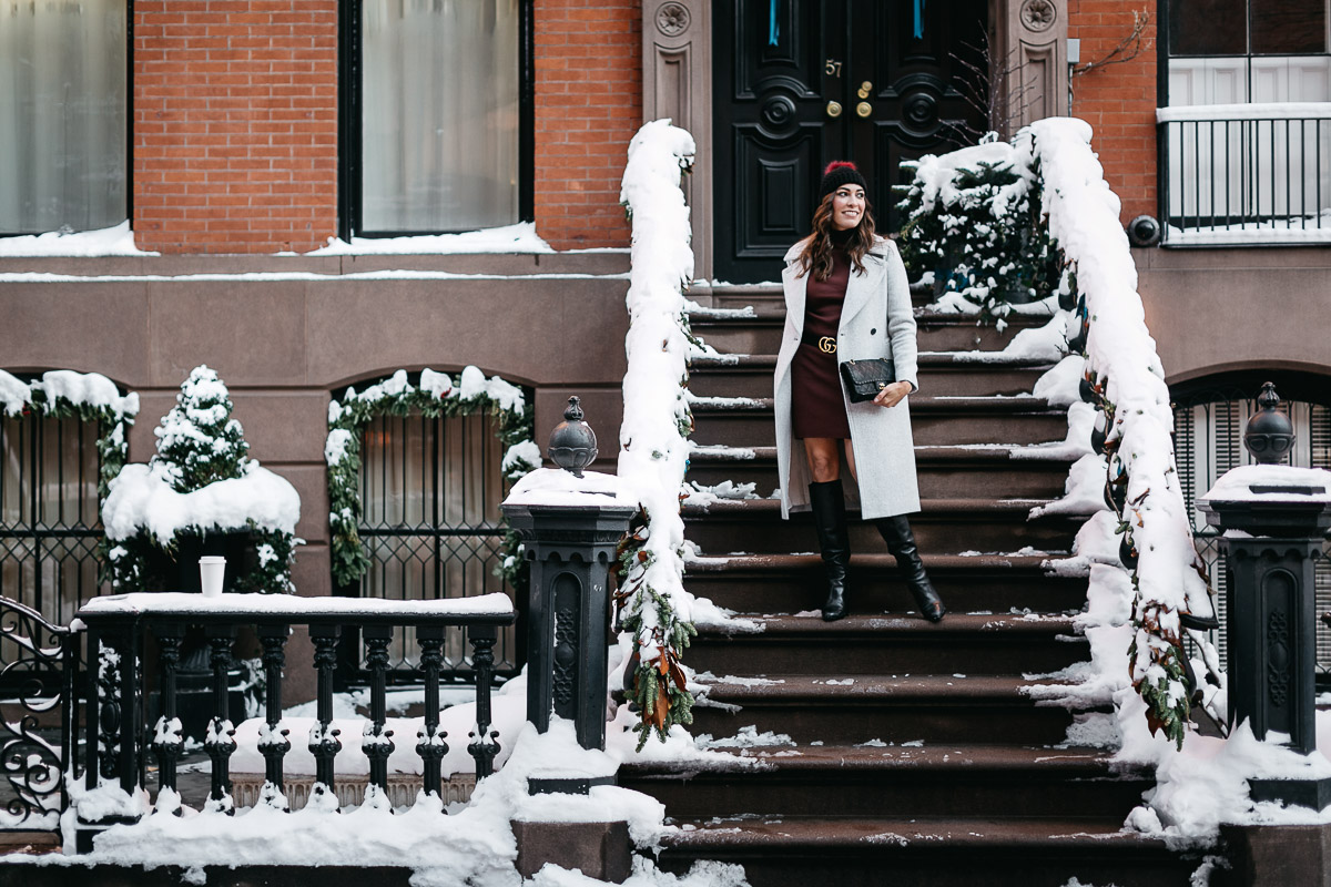 Burgundy sweater dress styled with Gucci Double G belt is worn by Amanda from A Glam Lifestyle blog in Greenwich Village and shoes her NYFW street style