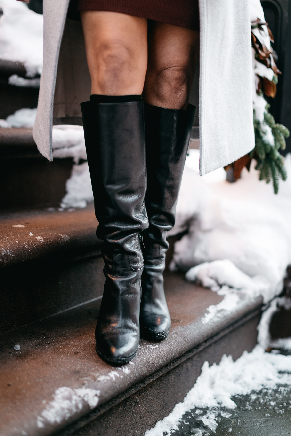 MGemi Pendolo black boots are styled by Amanda of A Glam Lifestyle blog and brings out her best NYFW street style