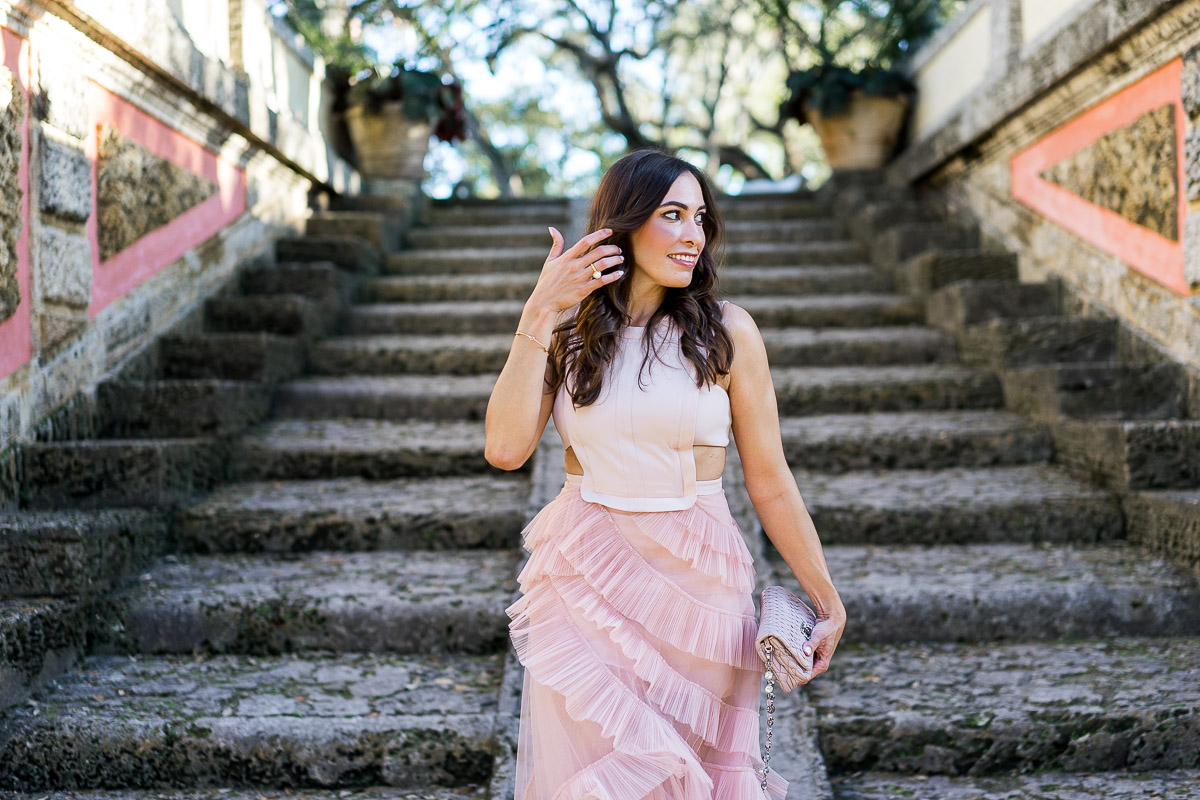 A Glam Lifestyle blogger Amanda wears sheer BCBG blush tulle dress at Viscaya in Miami