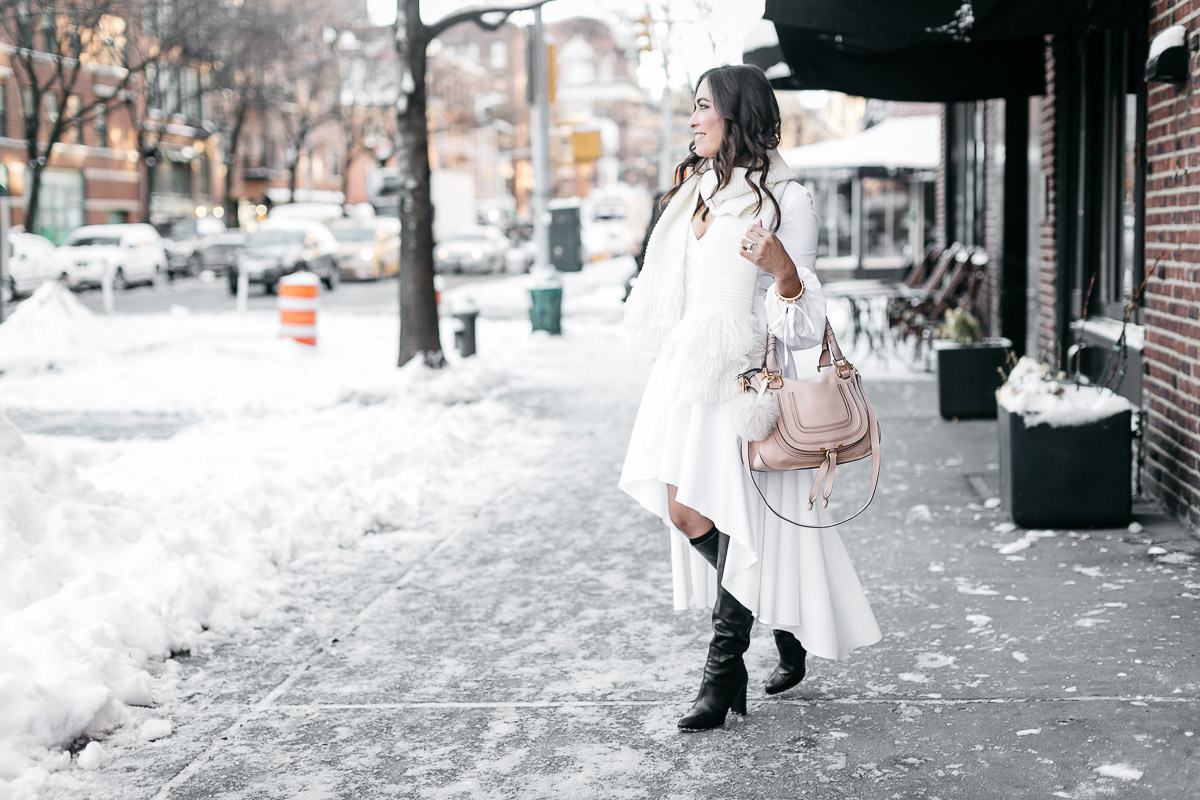 Fashion blogger Amanda wears Carolina Constas Lena white shirt dress in Greenwich Village during NYFW Spring 2017 with Chloe Marcie bag and MGemi Pendolo black boots