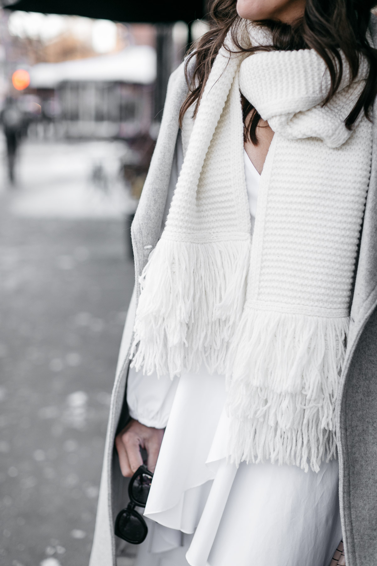 Club Monaco Juki white fringed scarf is styled by Amanda of A Glam Lifestyle blog during NYFW Spring 2017