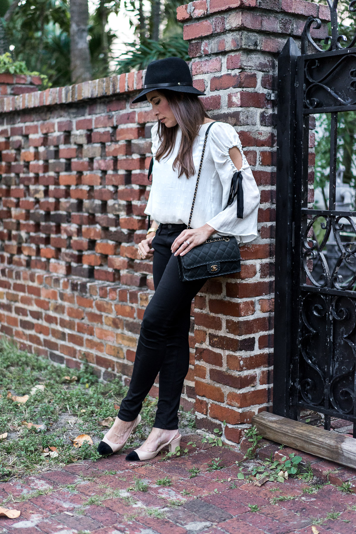 Club Monaco Priyalla top worn by Amanda of A Glam Lifestyle blog with her AG black legging jeans and Ivanka Trump Liah slingback pumps