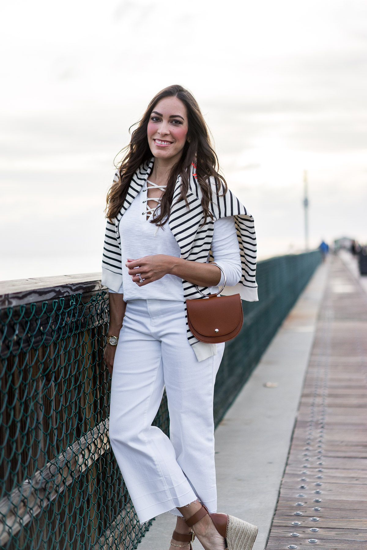 Old Navy striped french terry sweatshirt is a great Spring transitional piece for neutral nautical style styled by A Glam Lifestyle blogger Amanda with Old Navy lace up tee and white wide leg denim