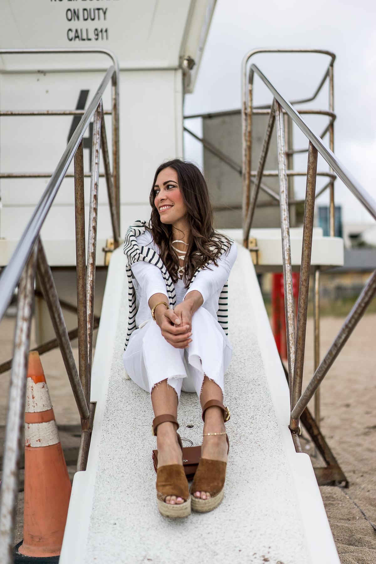 Old Navy Spring favorites include a chic white lace up tee and white wide leg denim worn by A Glam Lifestyle blogger Amanda