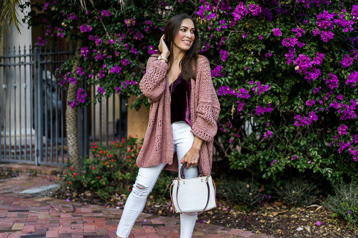 AGlamLifestyle fashion blogger Amanda carries her Coach Rogue bag to show her Spring style