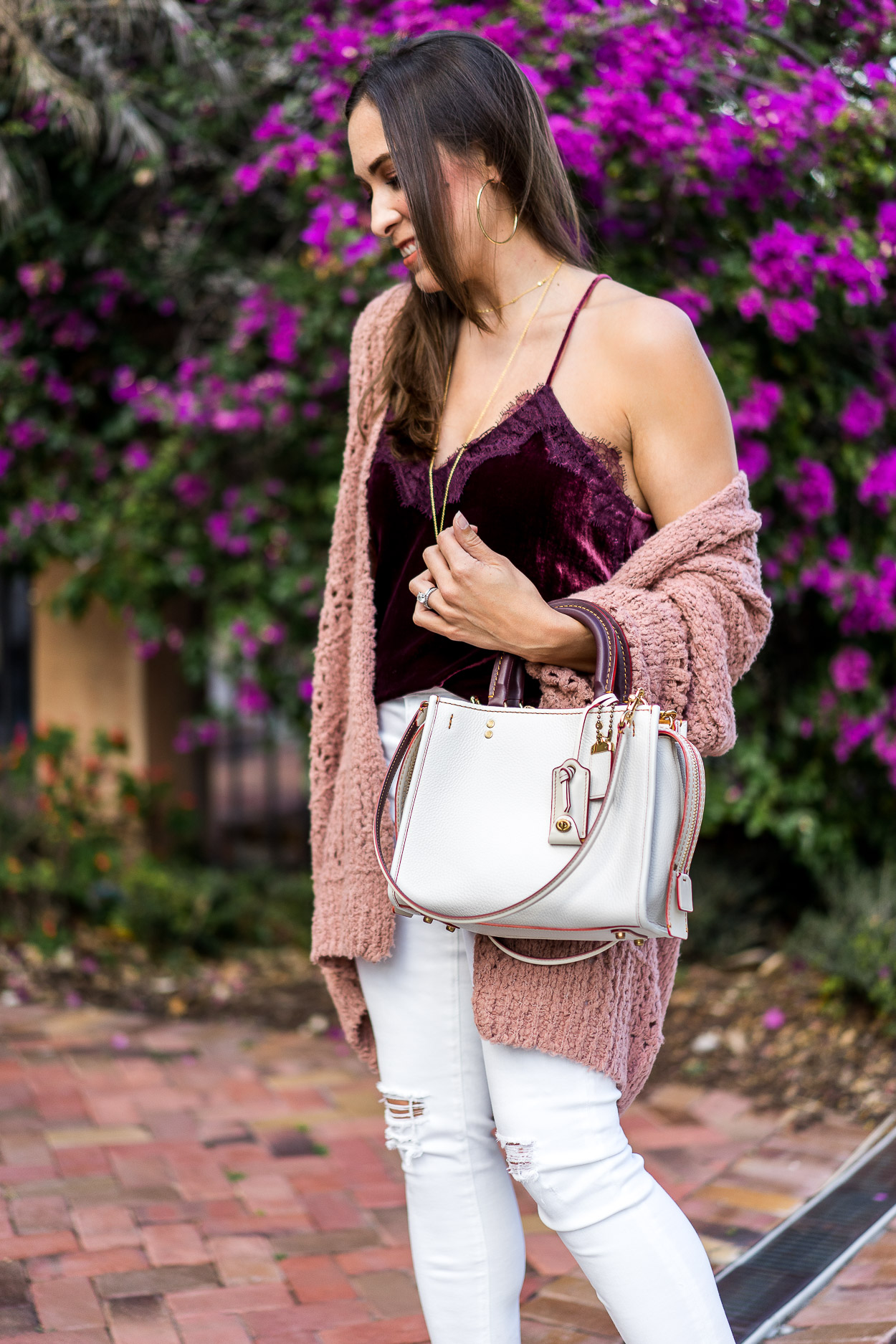 Coach Rogue bag styled with blush cardigan and velvet cami by AGlamLifestyle blogger