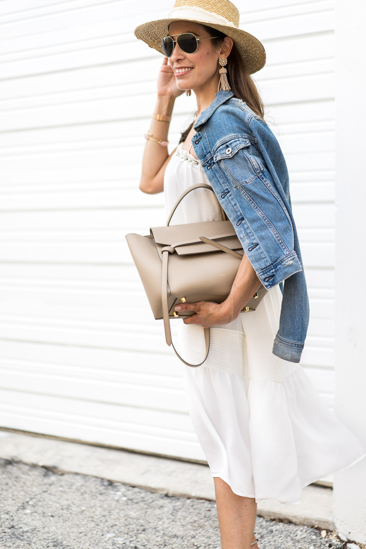 Memorial Day outfit inspo by blogger Amanda in an Endless Rose white dress and AG Jeans denim jacket