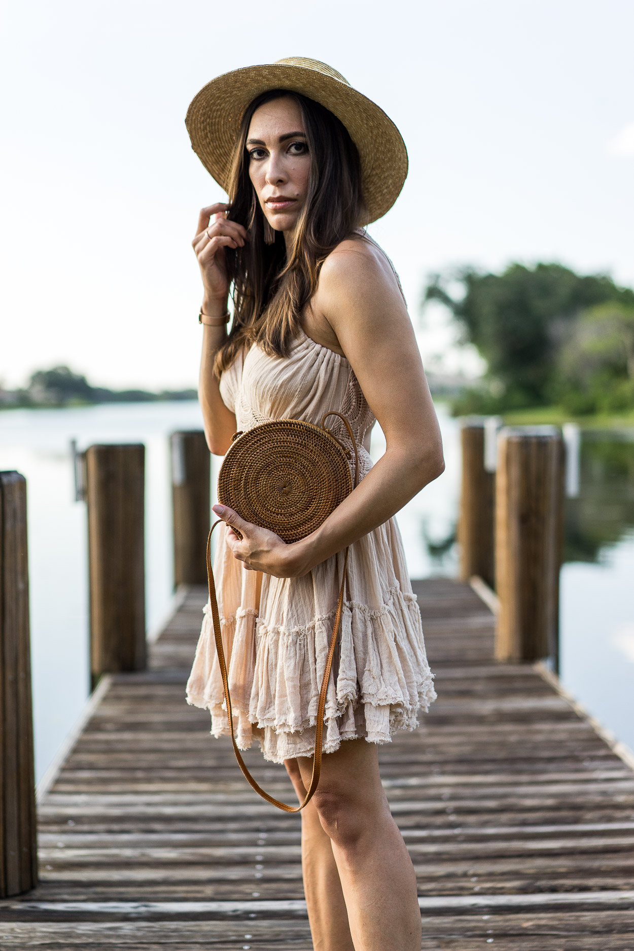 Summer calls for a Free People boho dress like this 200 Degrees Mini dress styled by Amanda of AGlamLifestyle blog with a round basket bag and Rag and Bone straw boater hat