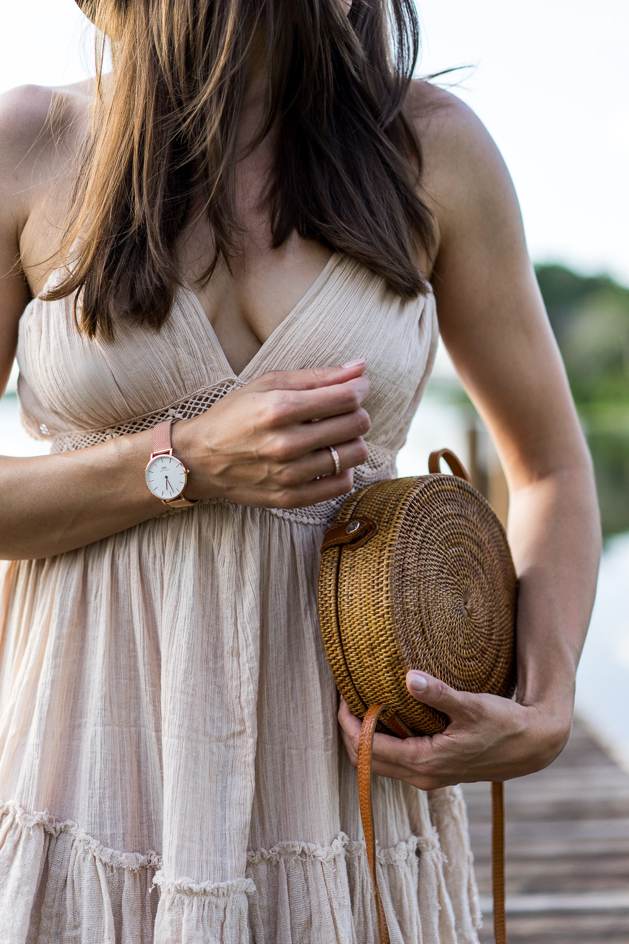 Amanda of A Glam Lifestyle blog wears Daniel Wellington Classic Petite Rose Gold watch with Free People 200 Degrees mini dress and round basket bag for essential Summer style