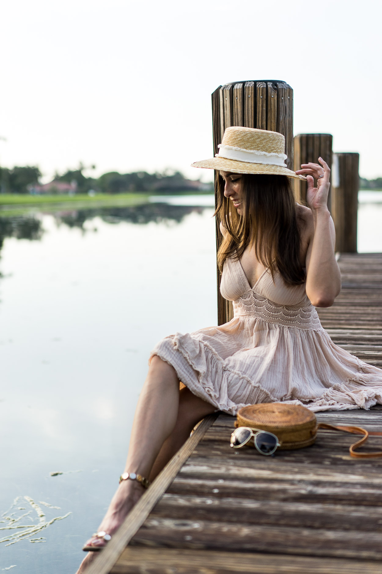 Boho inspired style for Summer with the Free People 200 Degrees mini dress worn by Amanda of A Glam Lifestyle blog with Warby Parker aviators and round basket bag from Etsy