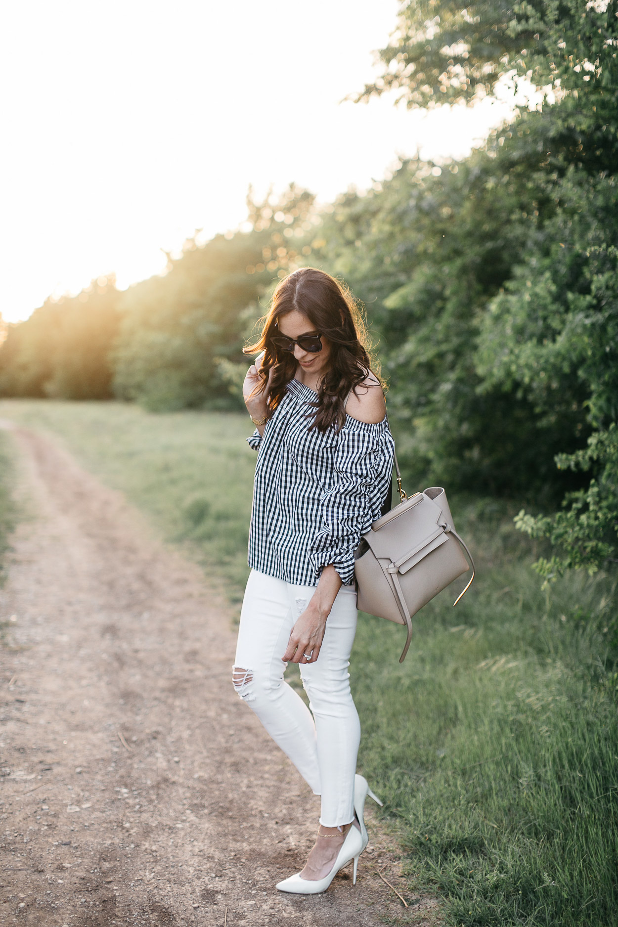 Gingham top for Spring by Chicwish worn by South Florida fashion blogger Amanda of AGlamLifestyle with Celine Belt bag and AG Jeans white legging jeans