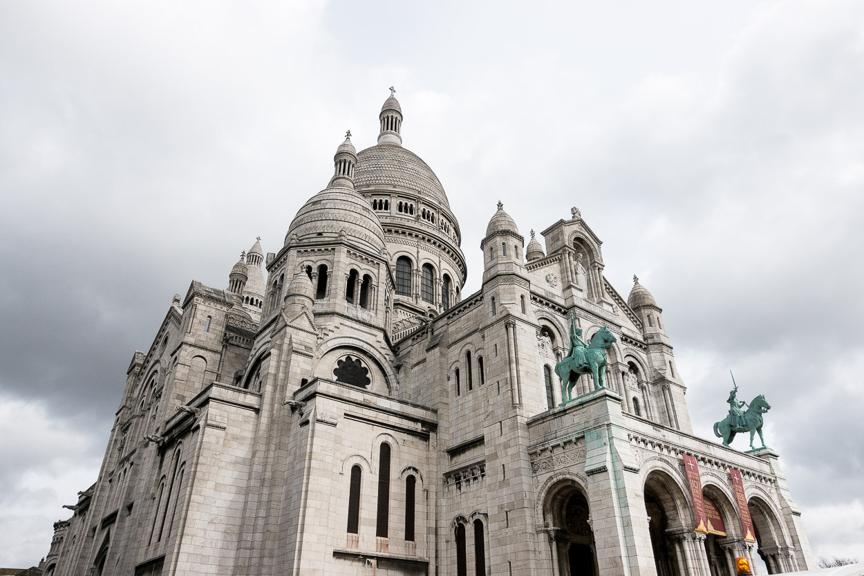 Visiting the Sacre Coeur church is one of the best things to do in Montmartre recommended by A Glam Lifestyle blogger Amanda for planning a trip to Paris