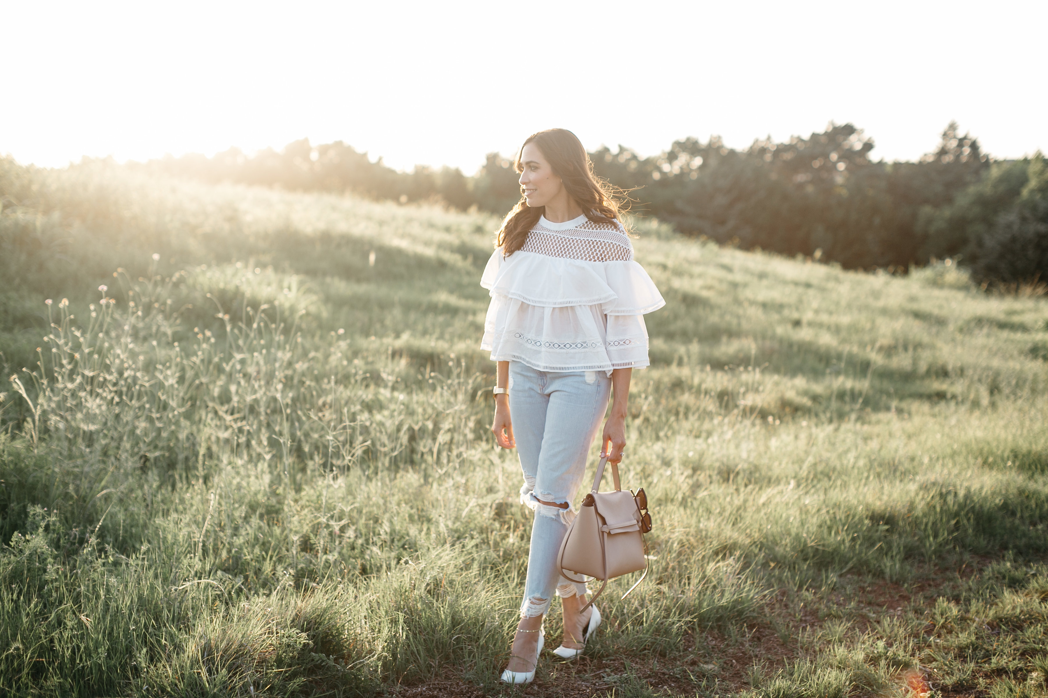 Chicwish tiered ruffle top styled with Lovers and Friends distressed jeans by South Florida blogger Amanda of A Glam Lifestyle