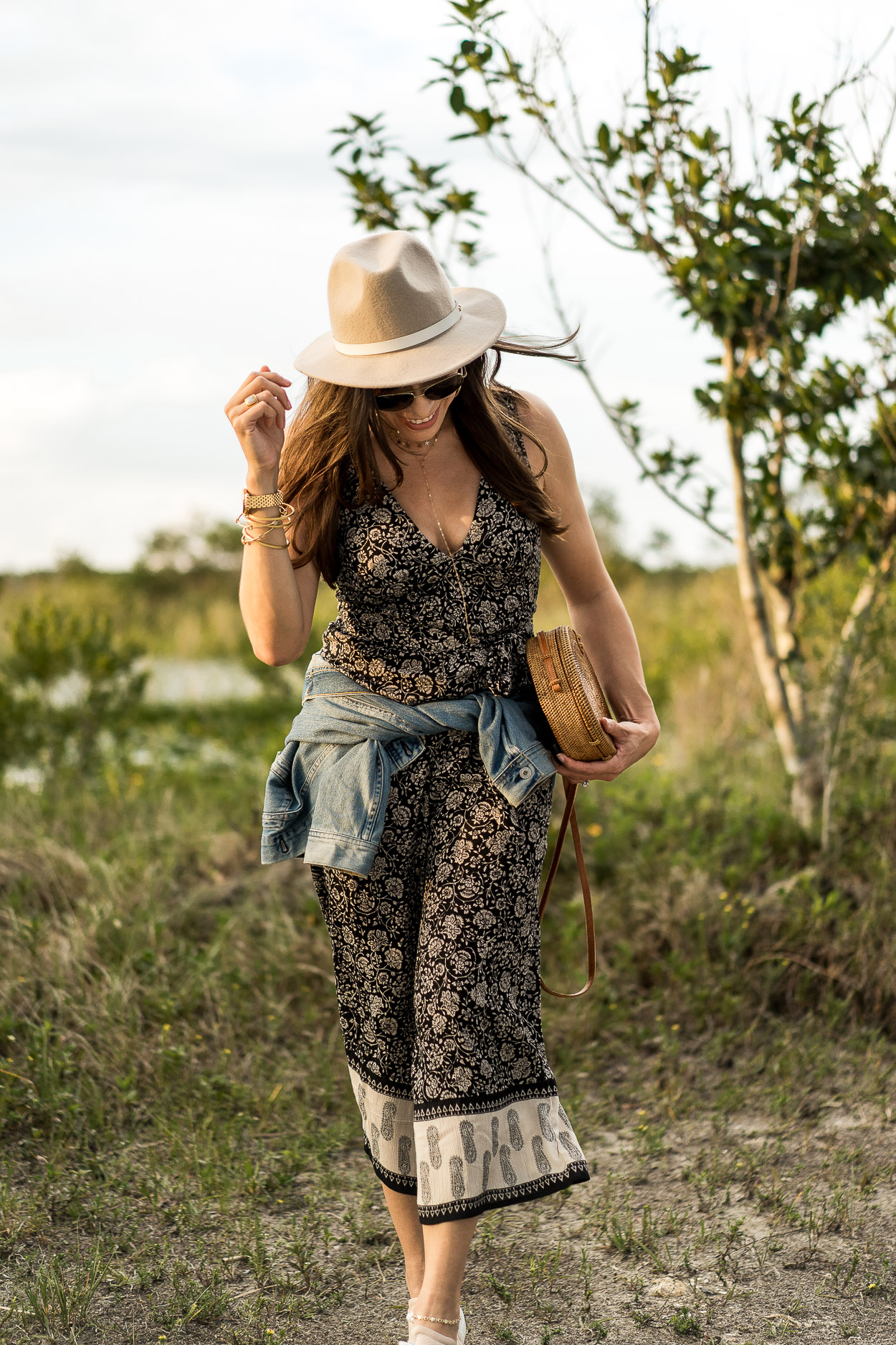 A boho style jumpsuit is a perfect Summer outfit as worn by fashion blogger Amanda of A Glam Lifestyle
