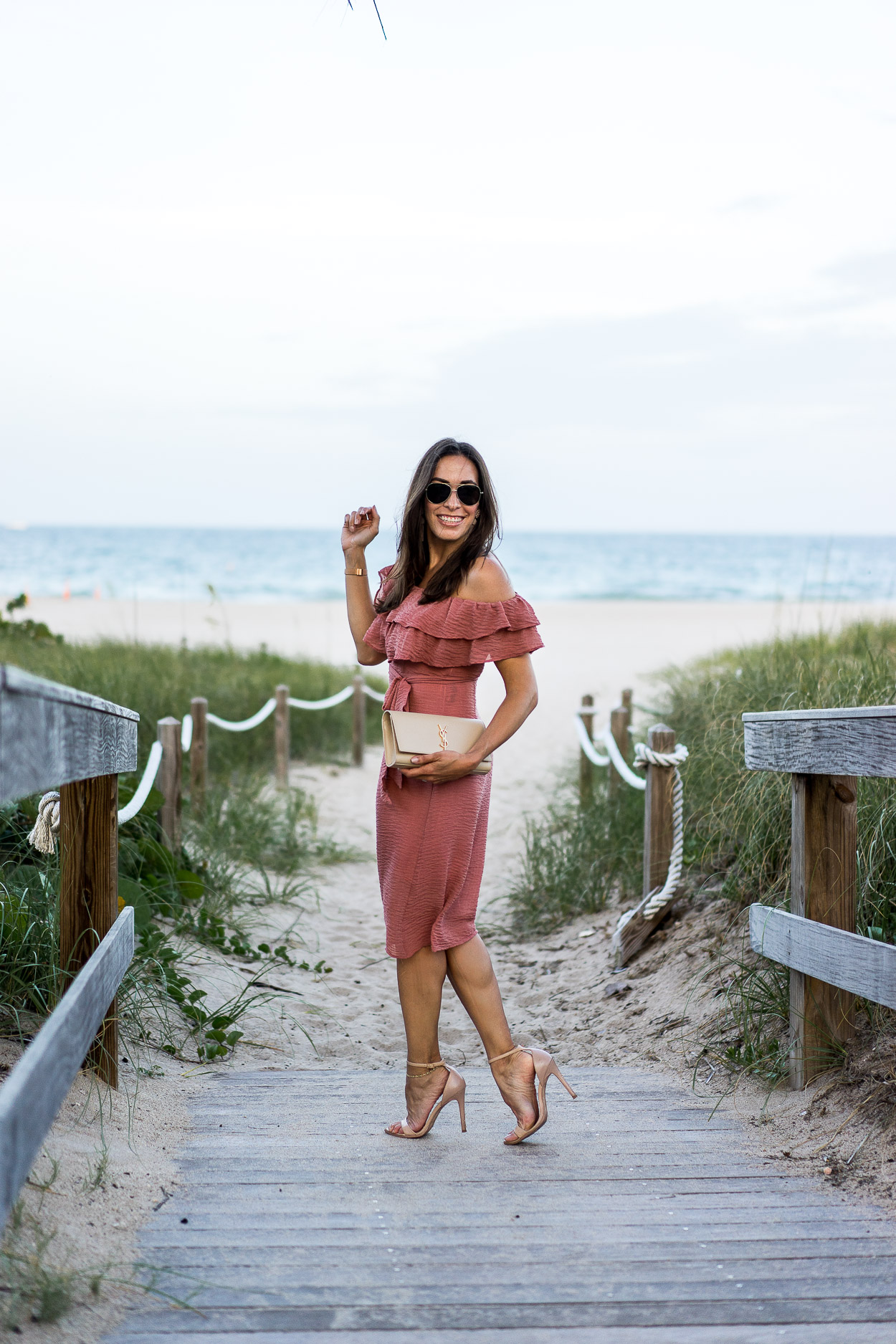 Accessorize your Summer style with pieces like a Chicwish dress, Warby Parker aviators and classic nude clutch like AGlamLifestyle blogger Amanda