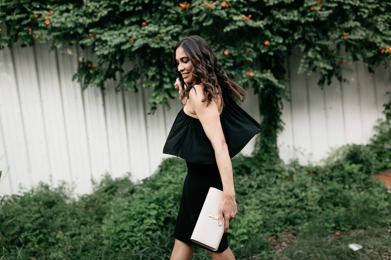 Twirl into date night with a soft black ruffle dress like this style by Three Dots worn by AGlamLifestyle blogger Amanda