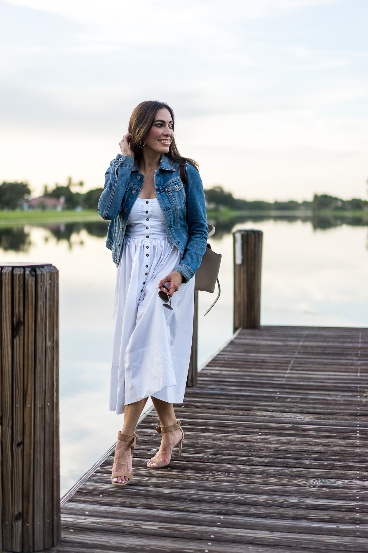 Top off your Summer white dress with a classic denim jacket by AG Jeans like blogger Amanda of A Glam Lifestyle