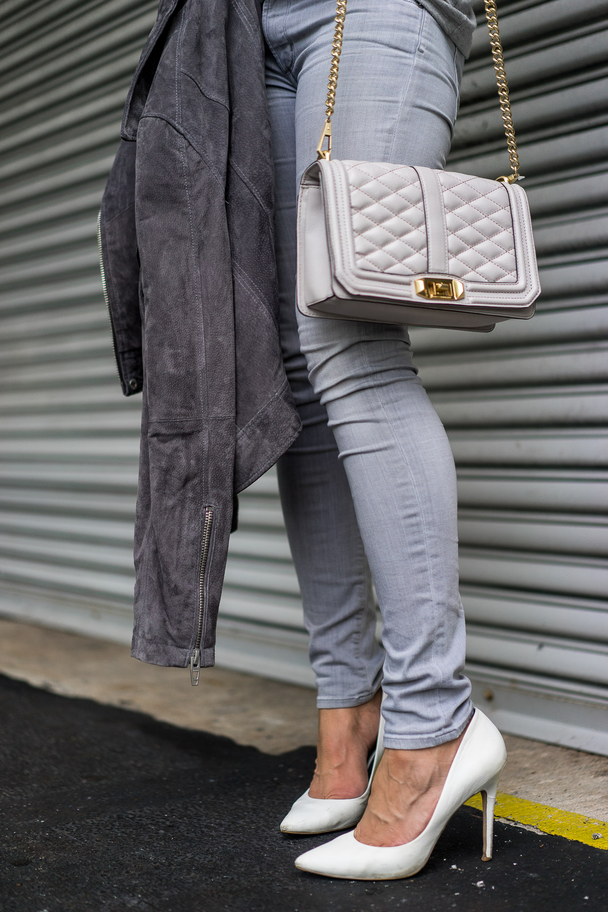 Blogger Amanda of A Glam Lifestyle wears Rebecca Minkoff Love Crossbody bag and Blank NYC grey suede jacket for easy Fall style