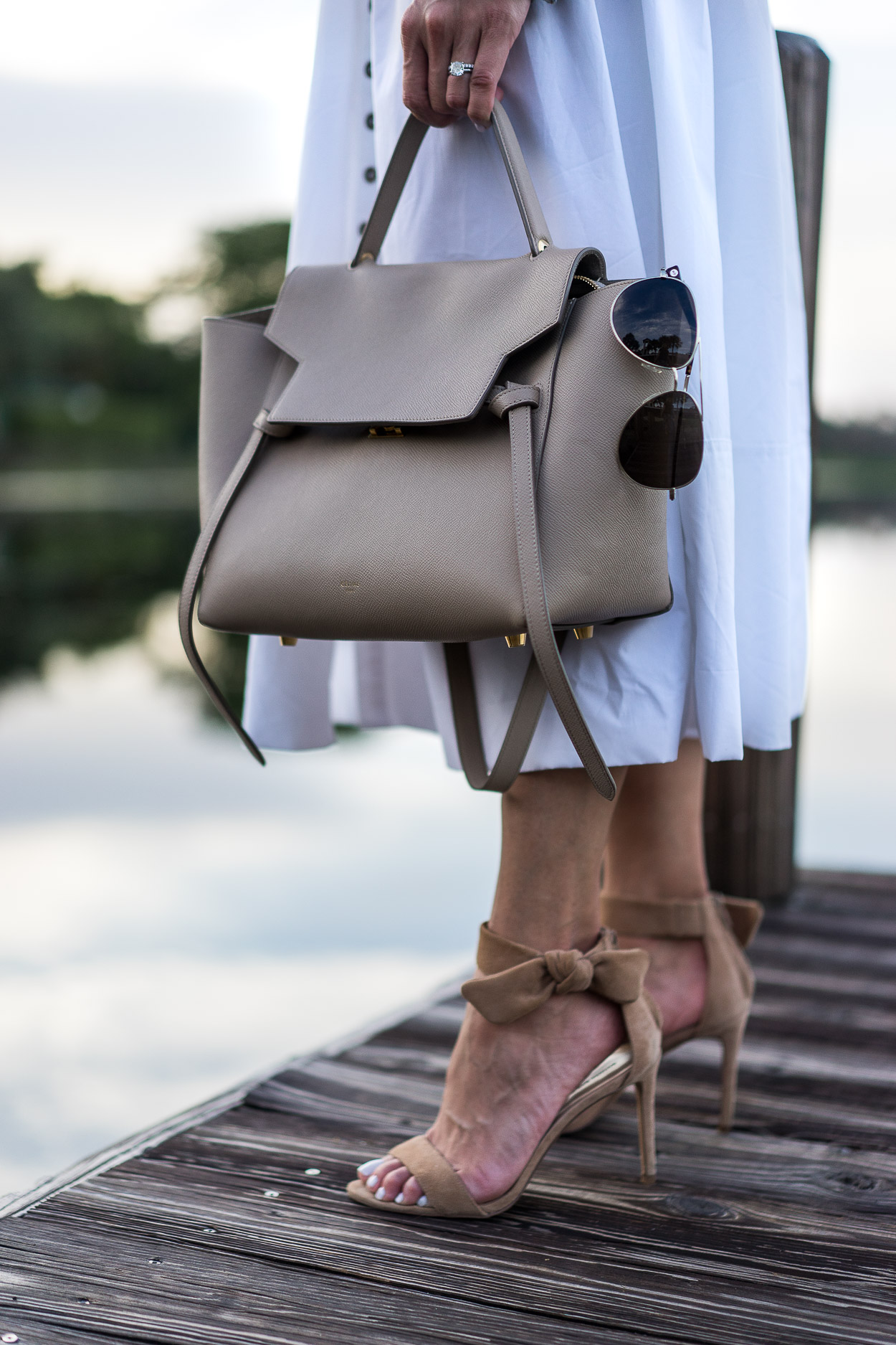 Celine belt bag and Banana Republic bow heels compliment Chicwish white summer dress styled by blogger AGlamLifestyle