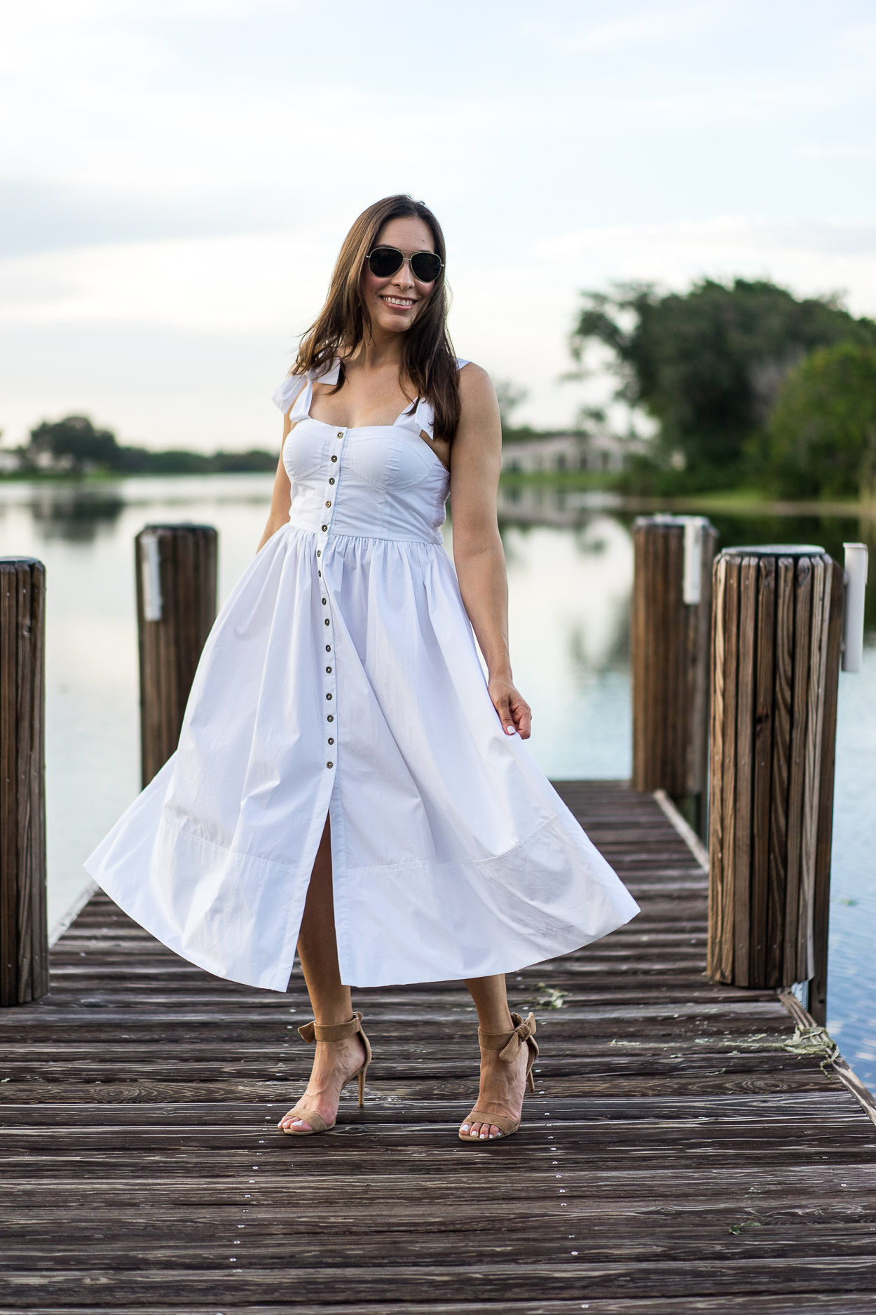 Twirl in a Summer white dress by Chicwish like South Florida blogger Amanda of A Glam Lifestyle