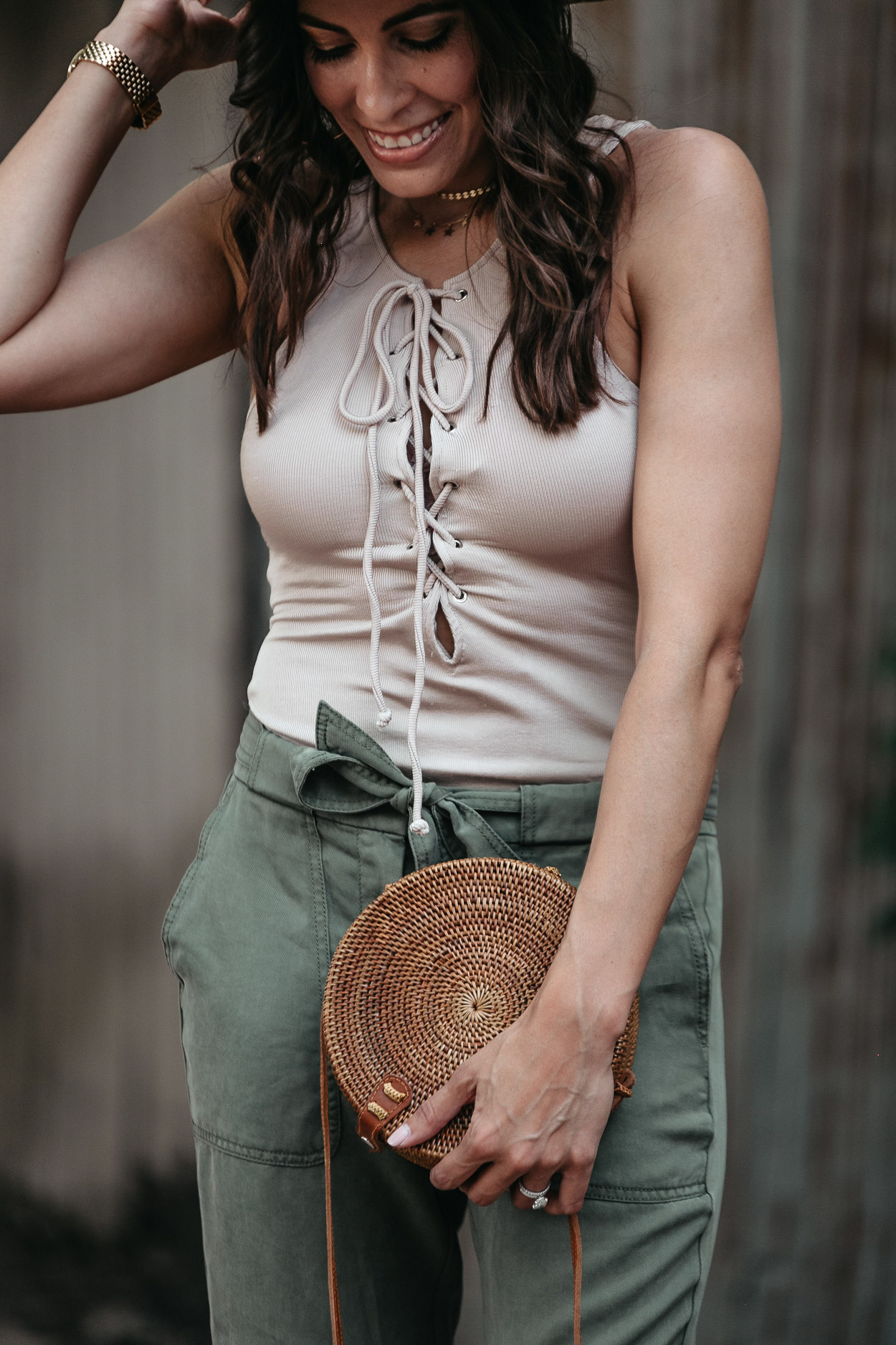 A nude lace up bodysuit is a sexy Summer look worn by fashion blogger Amanda of A Glam Lifestyle