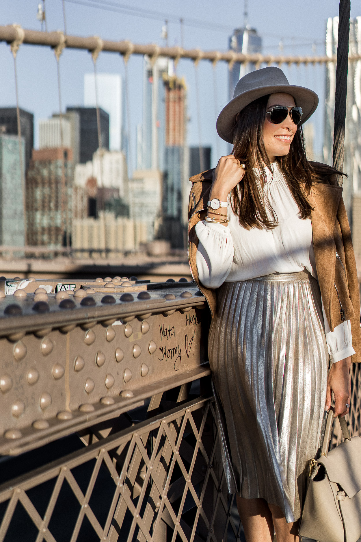 Mixing a metallic pleated skirt with neutrals makes for perfect Fall fashion shown by Amanda of A Glam Lifestyle blog