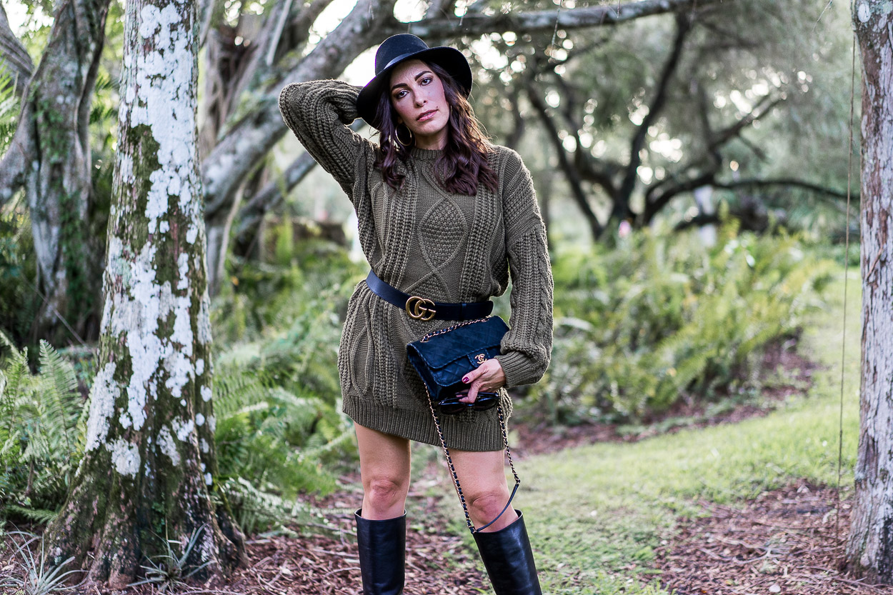 Wear this Chicwish sweater dress and nip it at the waist like AGlamLifestyle blogger Amanda