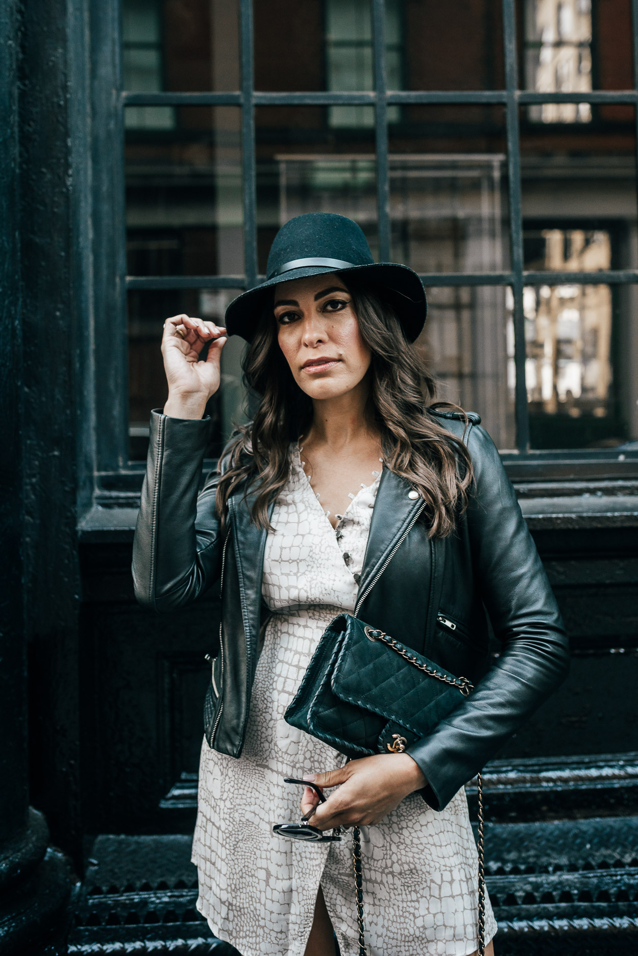 Gentle Fawn Elijah dress worn with Maje leather jacket and Chanel black bag by AGlamLifestyle blogger during NYFW SS18