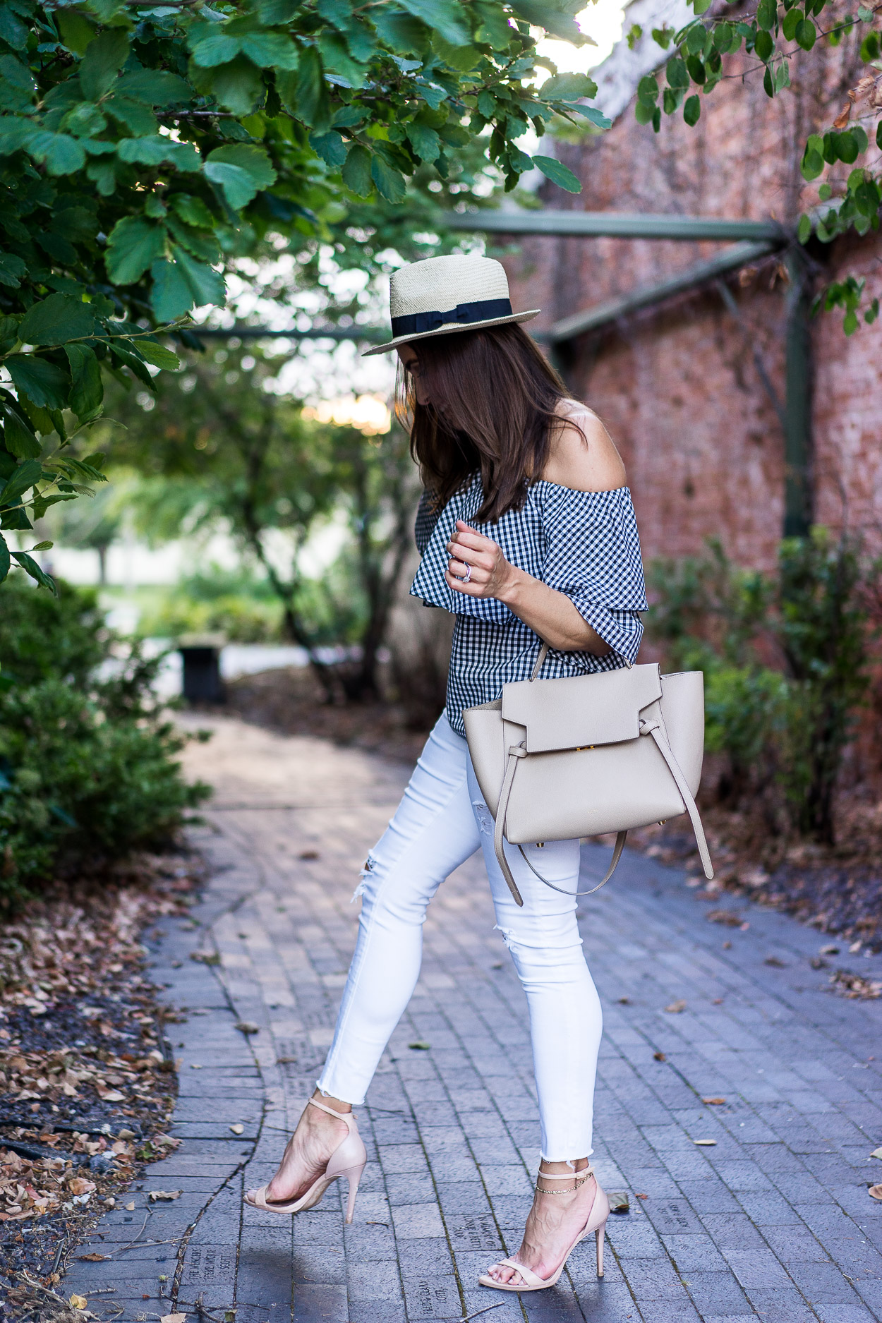 Easily transition your wardrobe from Summer to Fall with this Wayf gingham top and crisp white AG jeans a la blogger Amanda of A Glam Lifestyle