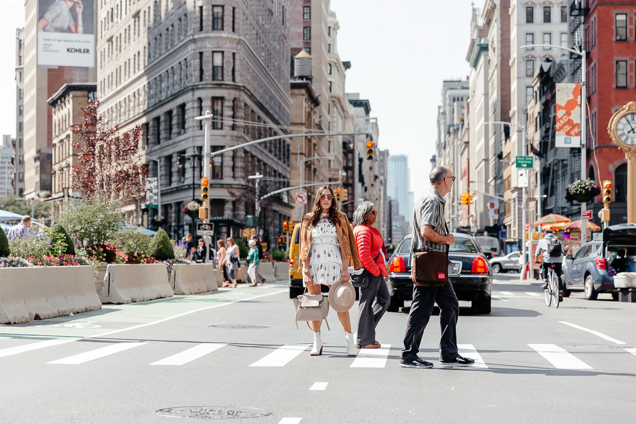 White booties and Chicwish dress stop traffic in the Flatiron district of NYC by blogger Amanda of A Glam Lifestyle