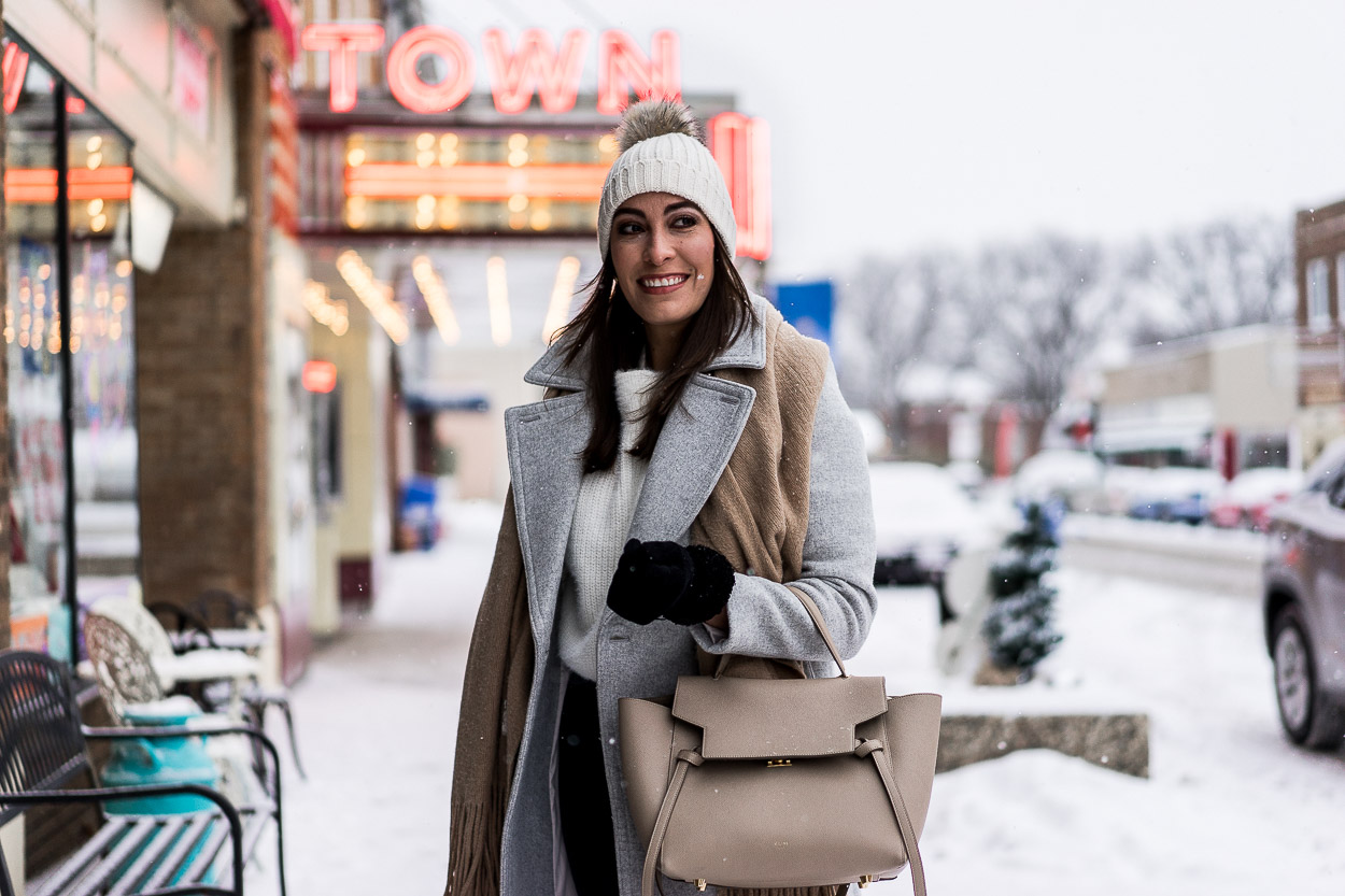 Layer your Chicwish jacket with a grey coat and fringed Free People scarf for a cute winter date night outfit